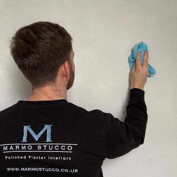 How do you clean polished plaster?